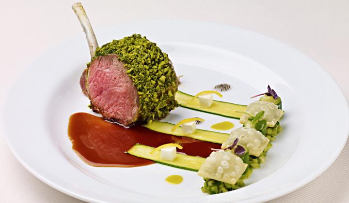 Pistachio-Crusted Lamb Chop with Minted Zucchini, Pistachio Pistou, Feta Cheese